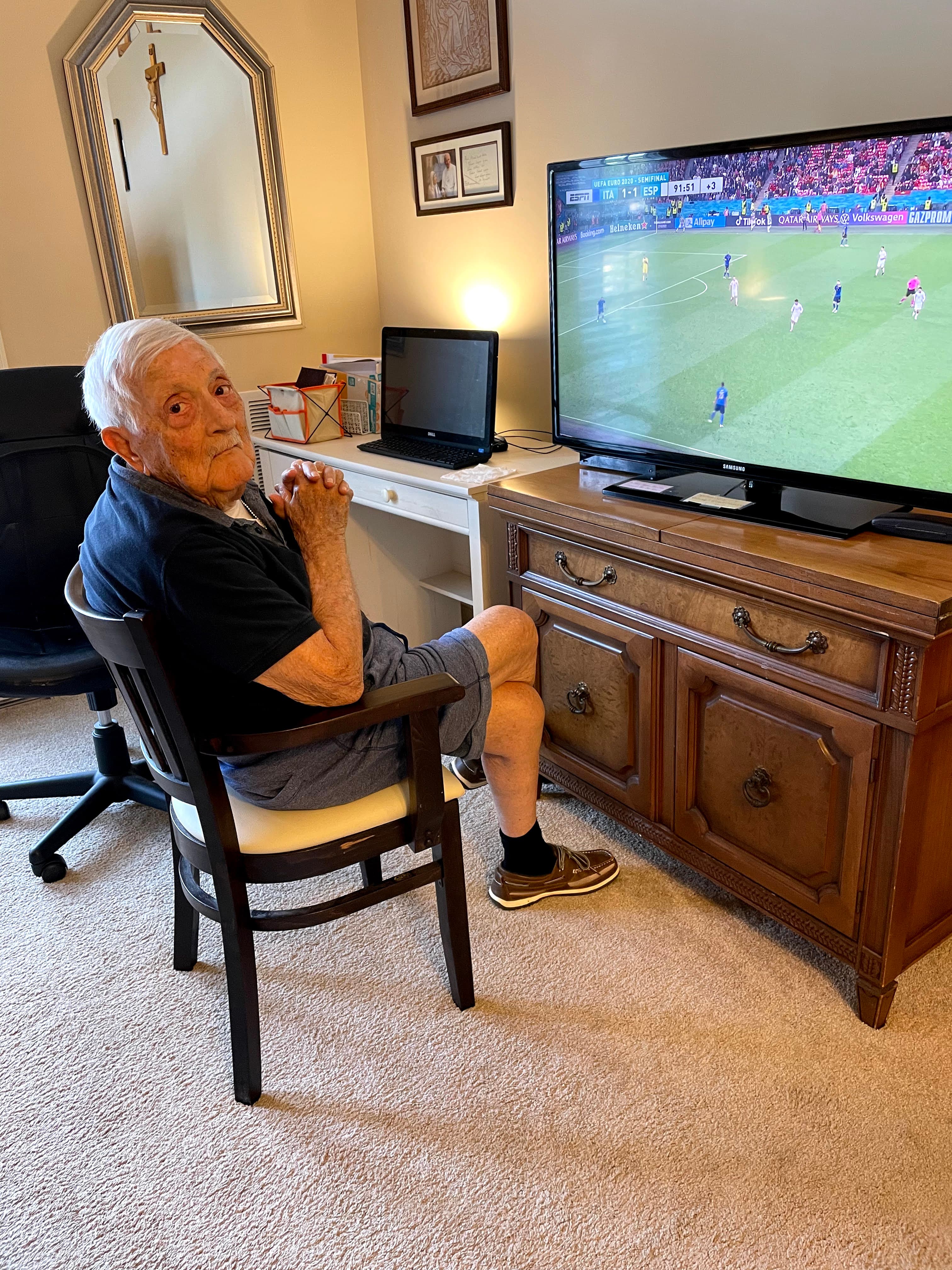 Pino Cirincione watching the Italy vs Spain UEFA Euro 2020 semifinal on television